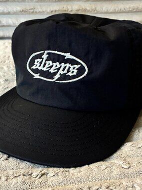 While She Sleeps Black Surf Cap with Embroidered Sleeps Chrome Logo